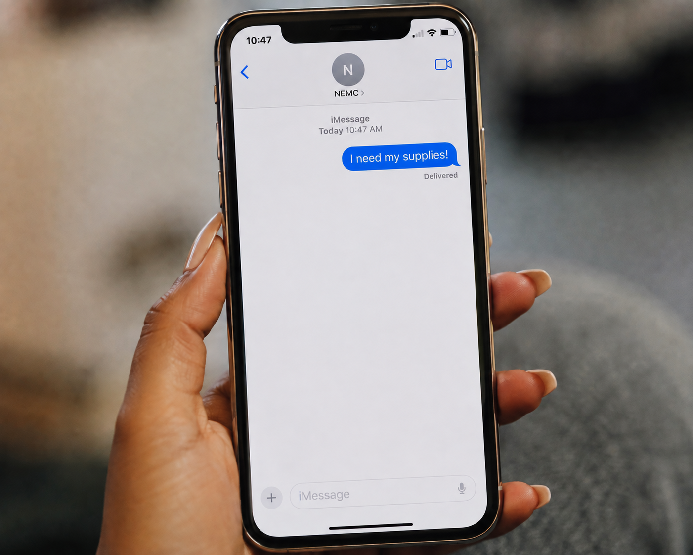 Phone displaying the text message I need my supplies